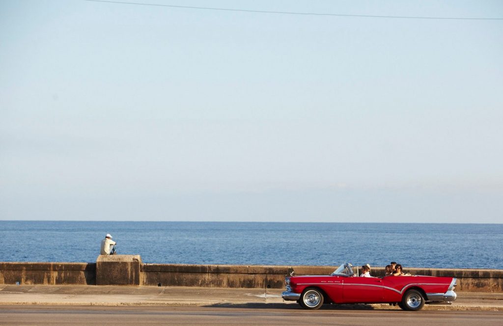 Vintage car ride along the Malecon in Havana