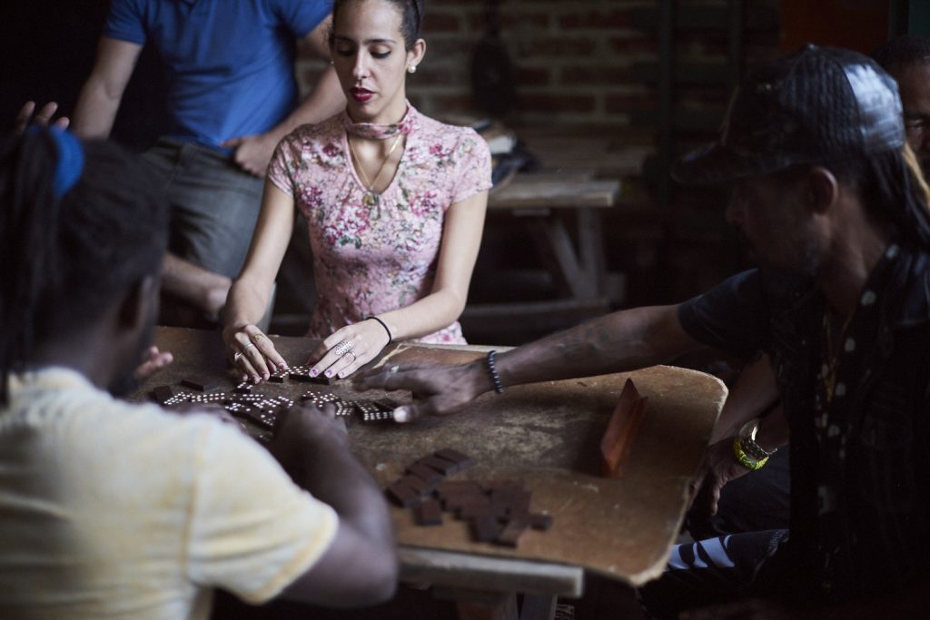 cuban playing dominoes, women empowerment