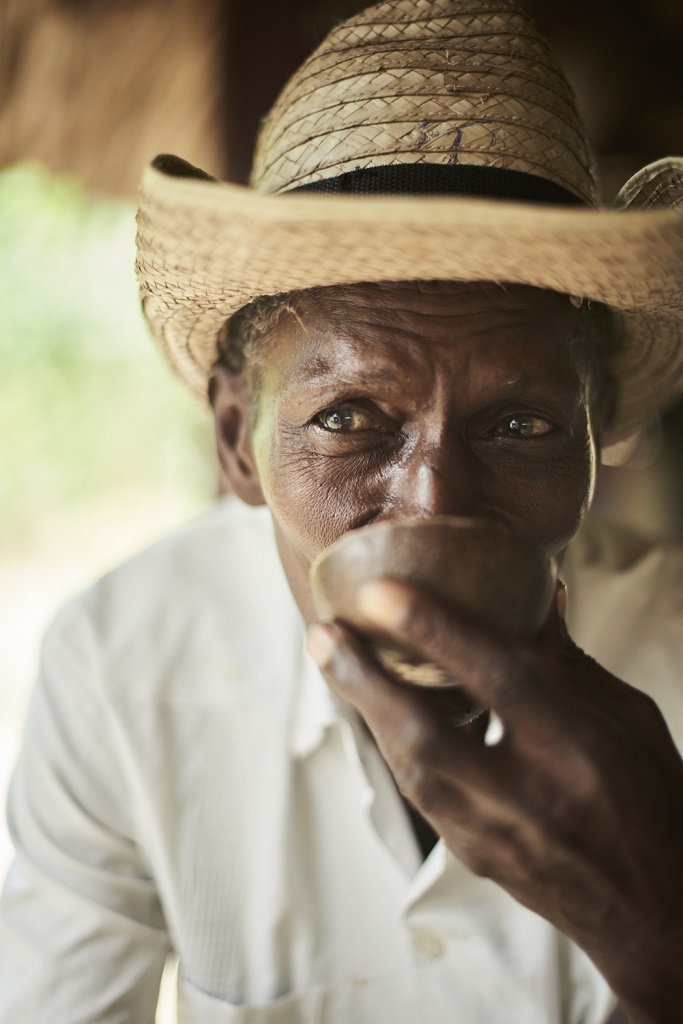 Old man drinking coffee